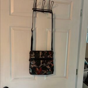 Sakroots Black Crossbody Bag with Art Deco Print